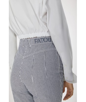 Pantalone flare in denim bio stampato En savoir plus